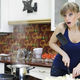 Illustration for article titled Strange Busty Russian Lady, Why in the Hell Are You Cooking Your Galaxy Nexus?